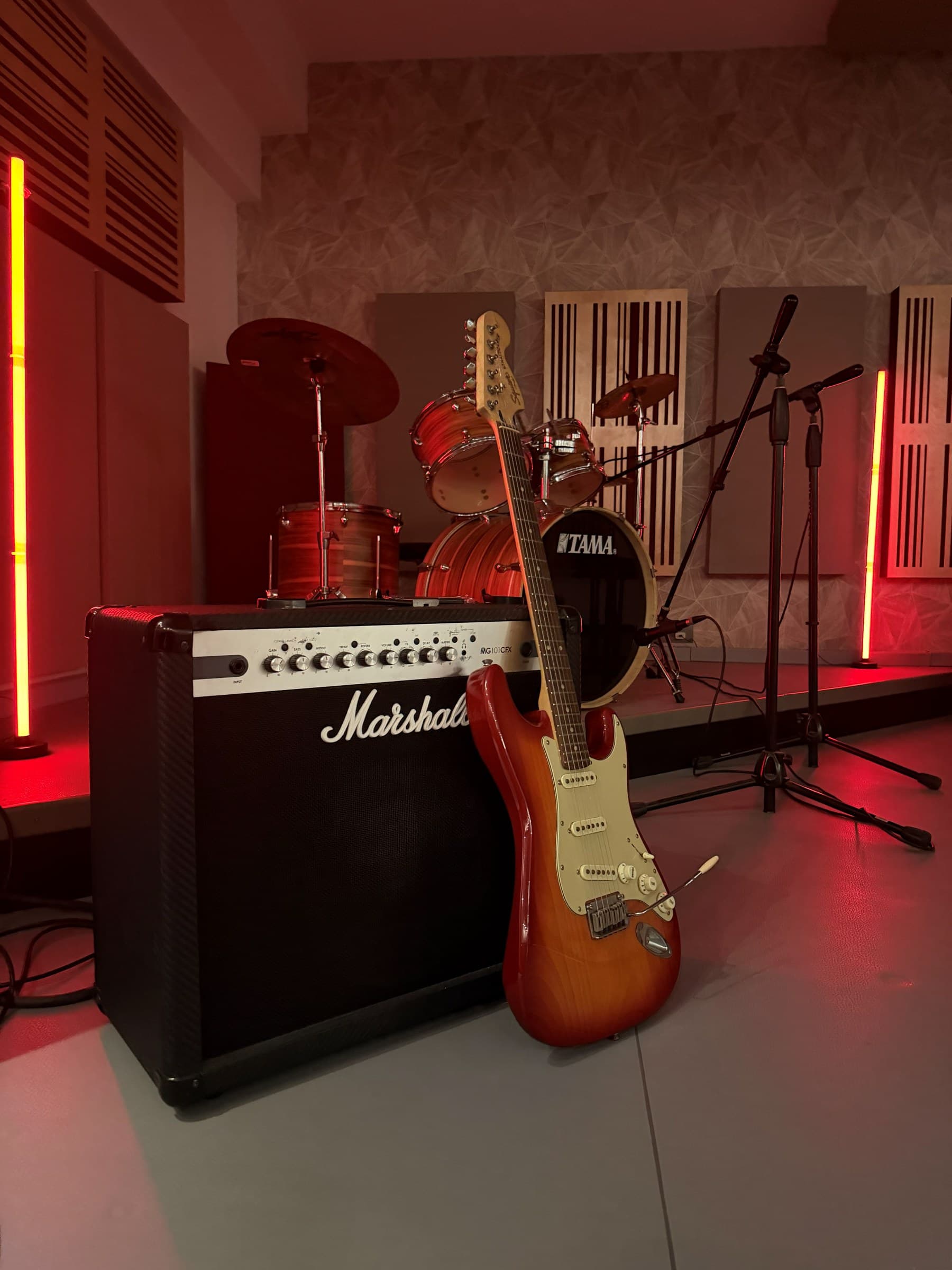 Fender Stratocaster leaning on a Marshall amp