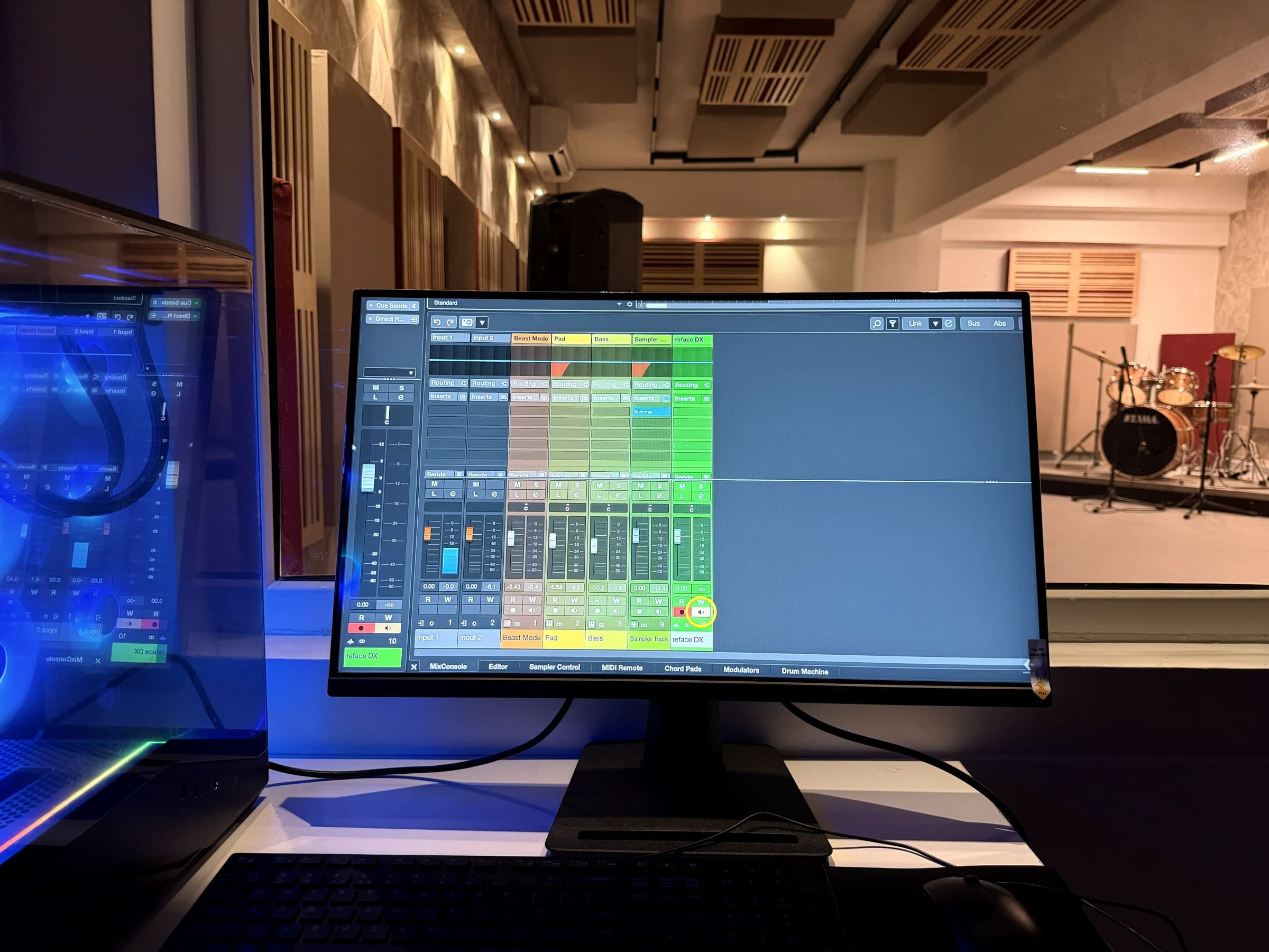 DAW session open on the studio monitor